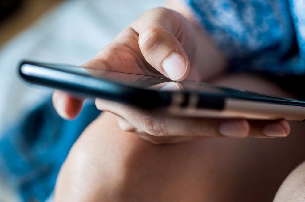 PHOTO: A person uses a cellphone in this stock photo.