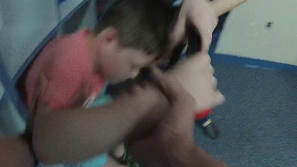 PHOTO: Bodycam footage of a child with autism seemingly being held down and handcuffed was released this week. 