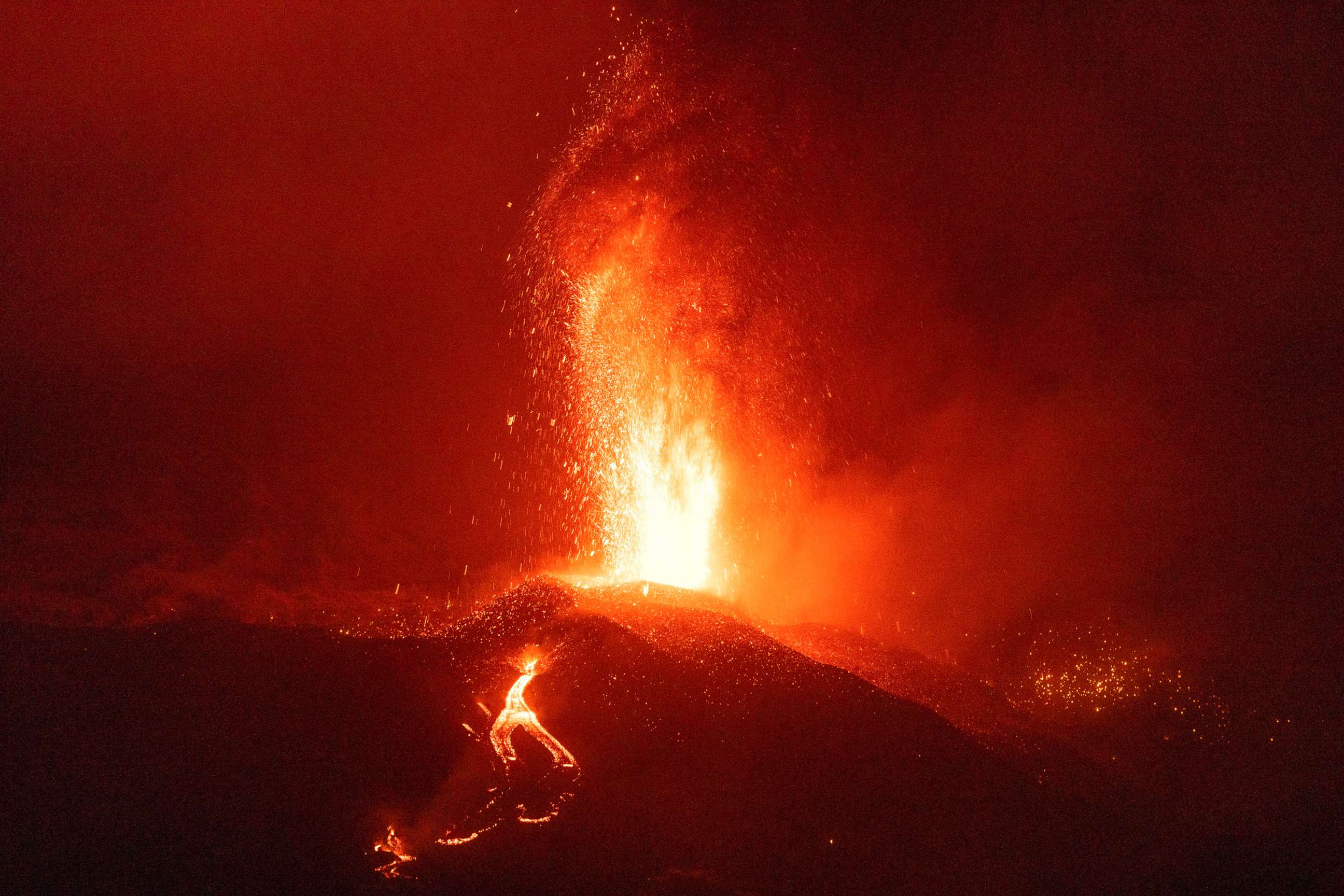PHOTO: Lava from a volcano eruption flows on the island of La Palma in the Canaries, Spain, Sept. 21, 2021. 