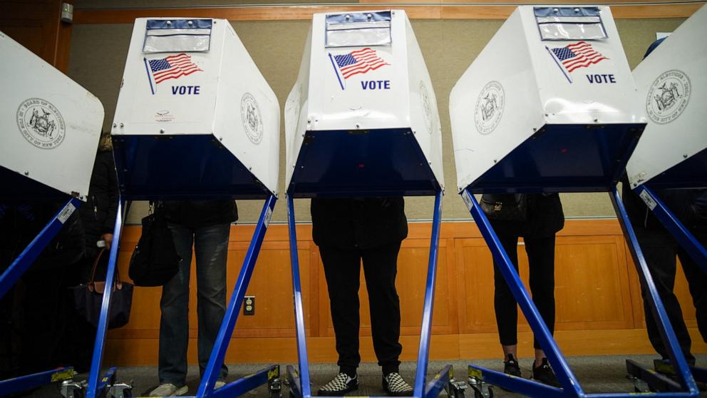 PHOTO: People cast their ballots on the first day of early voting for the US midterm elections, in New York, October 24, 2026.