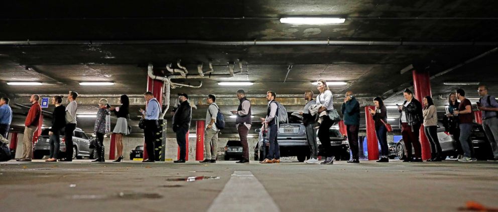 PHOTO: A line backs up into a parking garage outside a polling site on Election Day in Atlanta, Nov. 6, 2018.