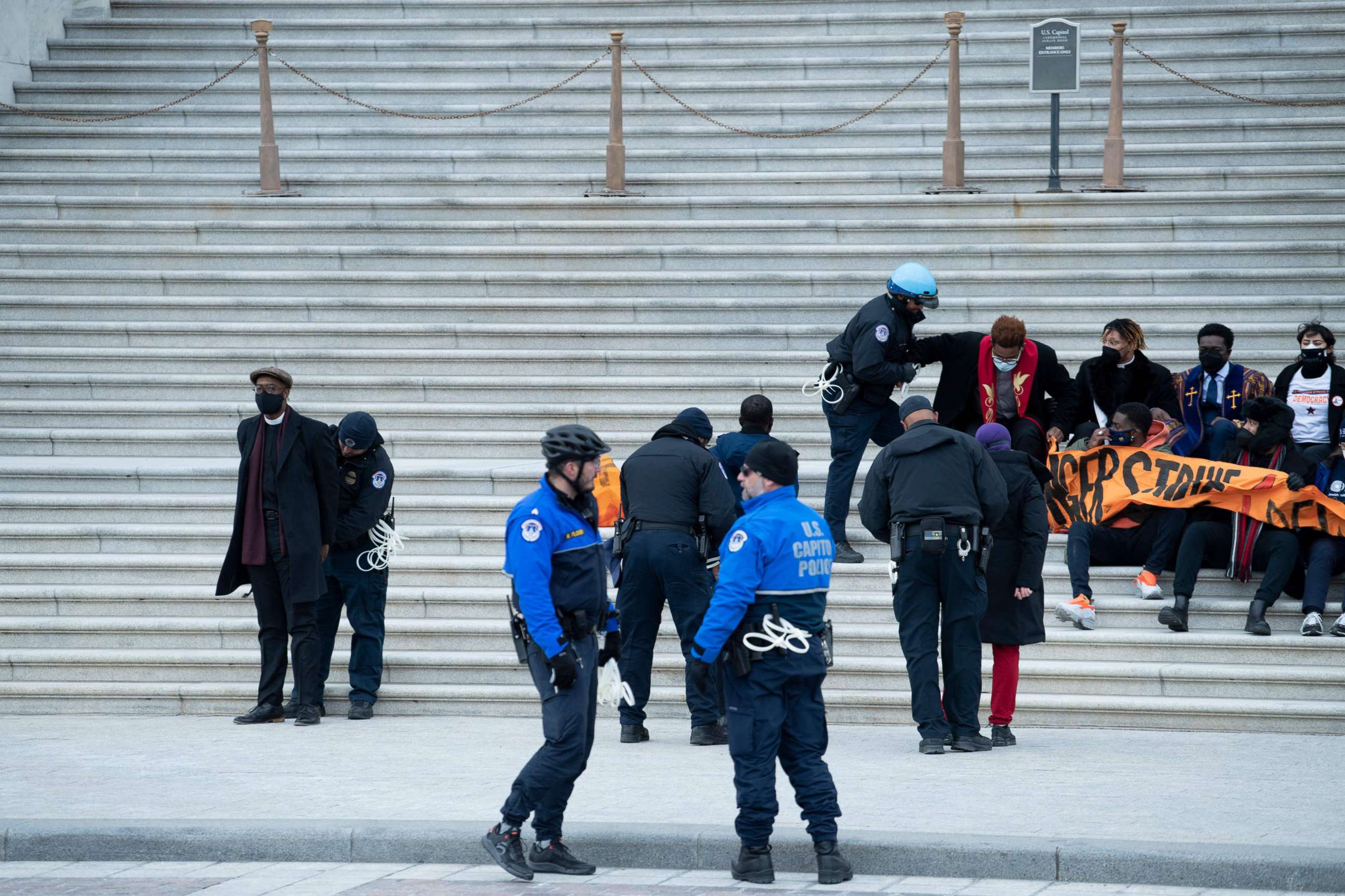 PHOTO: Police arrest activists outside the US Senate during a rally for voters' rights on Capitol Hill, Jan. 18, 2022, in Washington, DC.