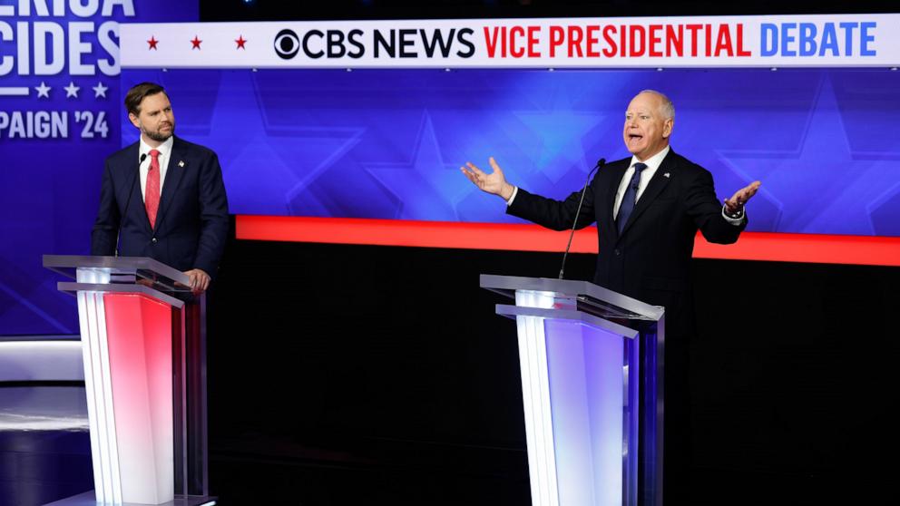 PHOTO: Democratic vice presidential nominee Minnesota Governor Tim Walz gestures as he speaks during a debate with Republican vice presidential nominee Sen. JD Vance in New York City, Oct. 1, 2024.