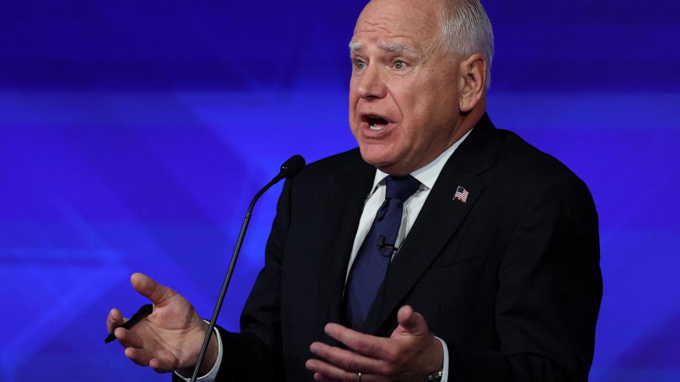 PHOTO: Democratic vice presidential nominee Minnesota Governor Tim Walz gestures as he speaks during a debate with Republican vice presidential nominee Sen. JD Vance in New York City, Oct. 1, 2024.