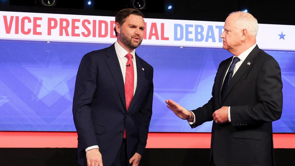 PHOTO: Republican vice presidential nominee Sen. JD Vance and Democratic vice presidential nominee Minnesota Gov. Tim Walz, arrive their vice presidential debate, Oct. 1, 2024, in New York City.