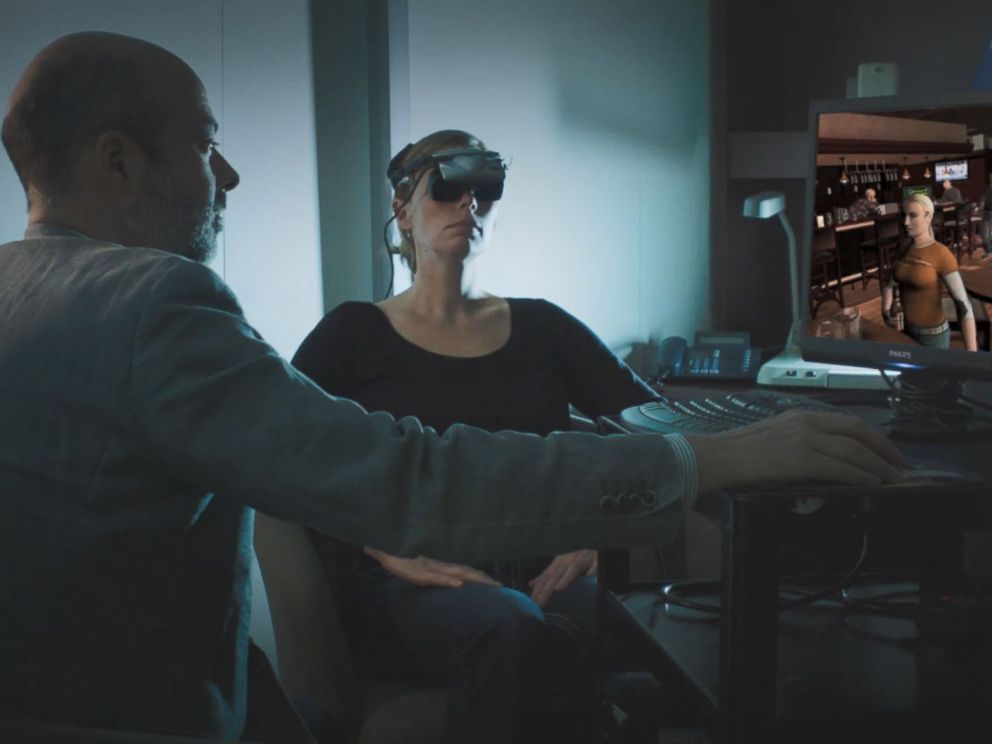 PHOTO: Dr. Stéphane Bouchard demonstrates a virtual reality therapy method that helps survivors of sexual assault face their fears
