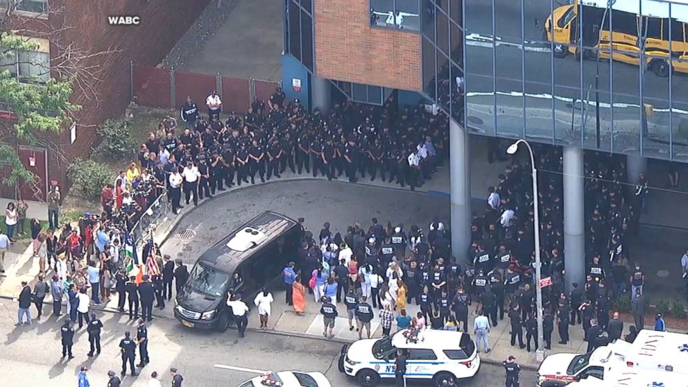 PHOTO: Hundreds of NYPD officers line the hospital exit, Aug. 11, 2017.