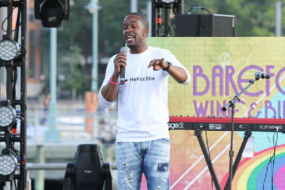 PHOTO: Former NFL player Wade Davis speaks at New York City Pride 2015 Rally at Pier 26 on June 26, 2015, in New York.