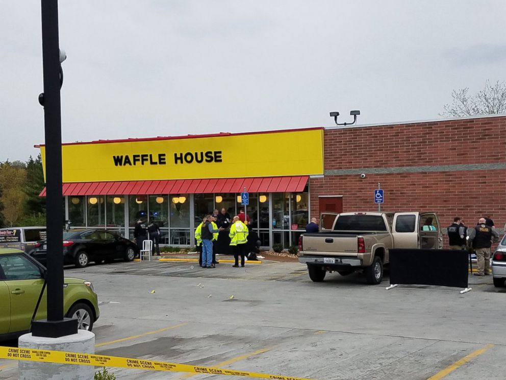 PHOTO: Metro Nashville Police Department experts investigate the scene of a shooting at a Waffle House near Nashville, Tenn., April 22, 2018.