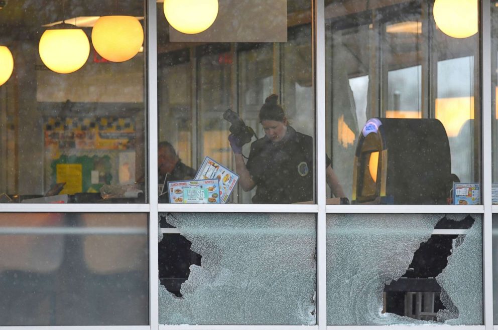 PHOTO: Metro Davidson County Police inspect the scene of a fatal shooting at a Waffle House restaurant near Nashville, Tenn., April 22, 2018.