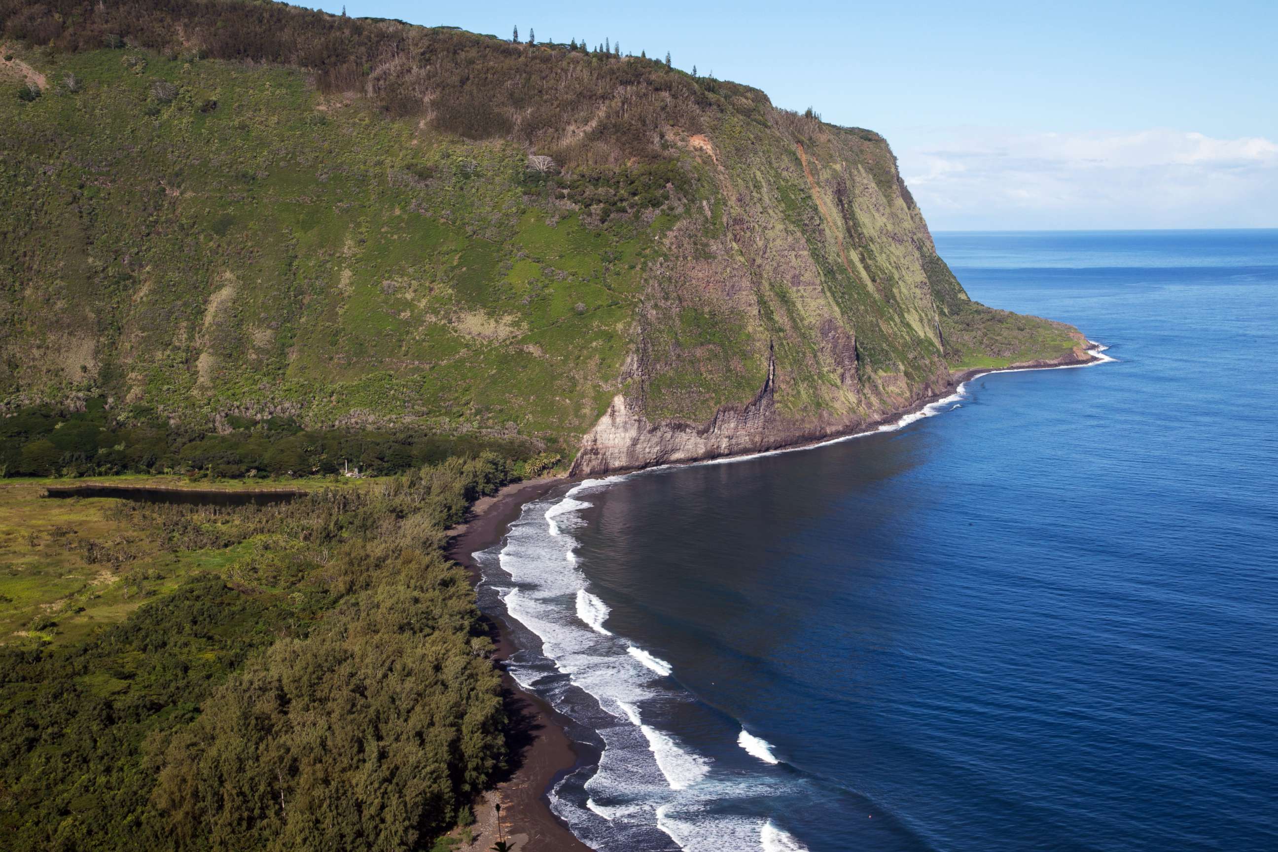 PHOTO: Black Sand Beach at Waipio Valley -  the residence of early Hawaiian kings.  A steep road leads down into Waipio Valley from a lookout point on the Big Island of Hawaii, Jan. 16, 2013.
