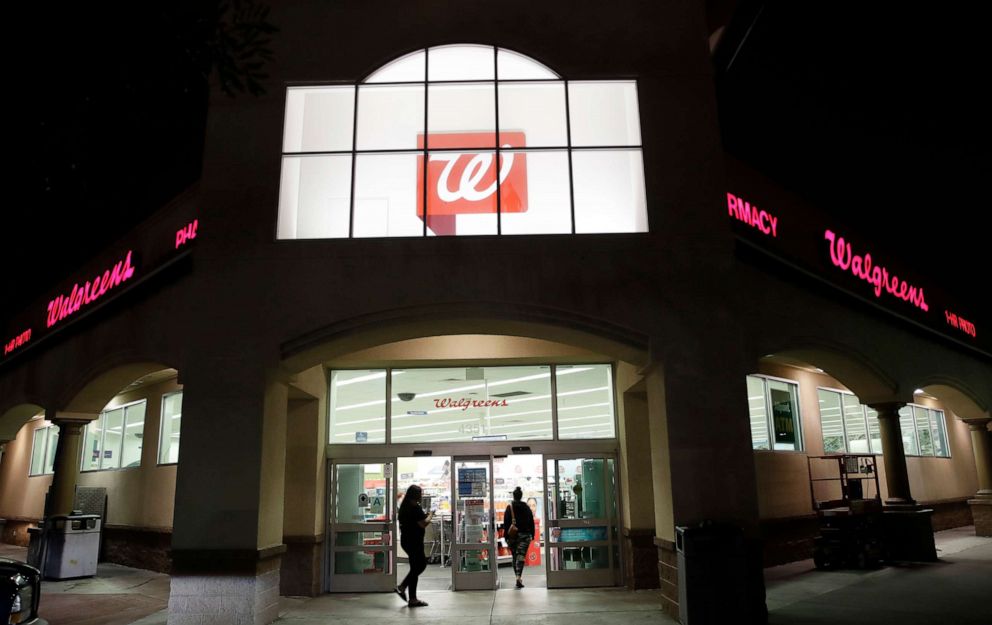 PHOTO: Shoppers enter a Walgreens store in Los Angeles, California, on June 24, 2019.