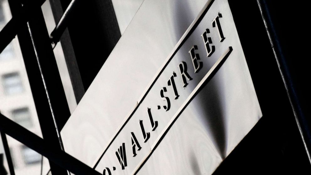PHOTO: This July 15, 2013, file photo, shows a sign for Wall Street outside the New York Stock Exchange.