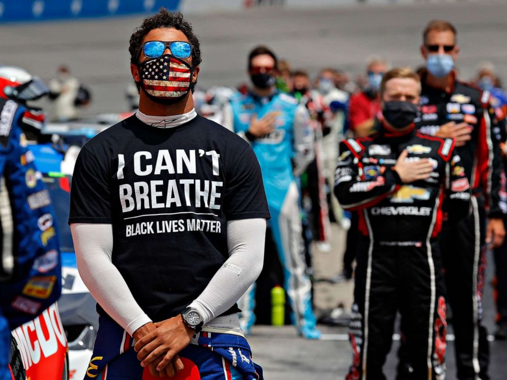 PHOTO: Darrell wears a t-shirt in solidarity with protest over the death of George Floyd during the national anthem prior to the NASCAR Cup Series Folds of Honor QuikTrip 500 at Atlanta Motor Speedway, June 7, 2020, in Hampton, Ga.