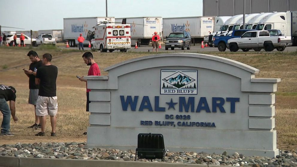 PHOTO: People gathering outside a Walmart distribution center in Red Bluff, Calif., June 27, 2020, after a shooting incident.