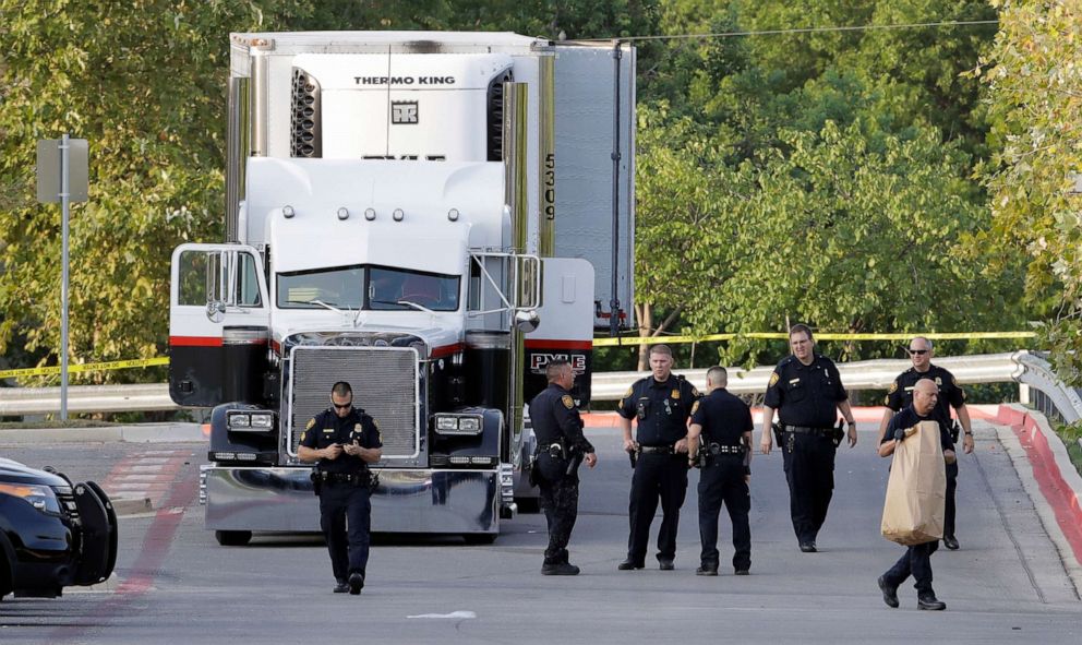 PHOTO: In 2017, eight people were found dead in a tractor-trailer loaded with at least 30 others outside a Walmart store in stifling summer heat, July 23, 2017, in San Antonio. 
