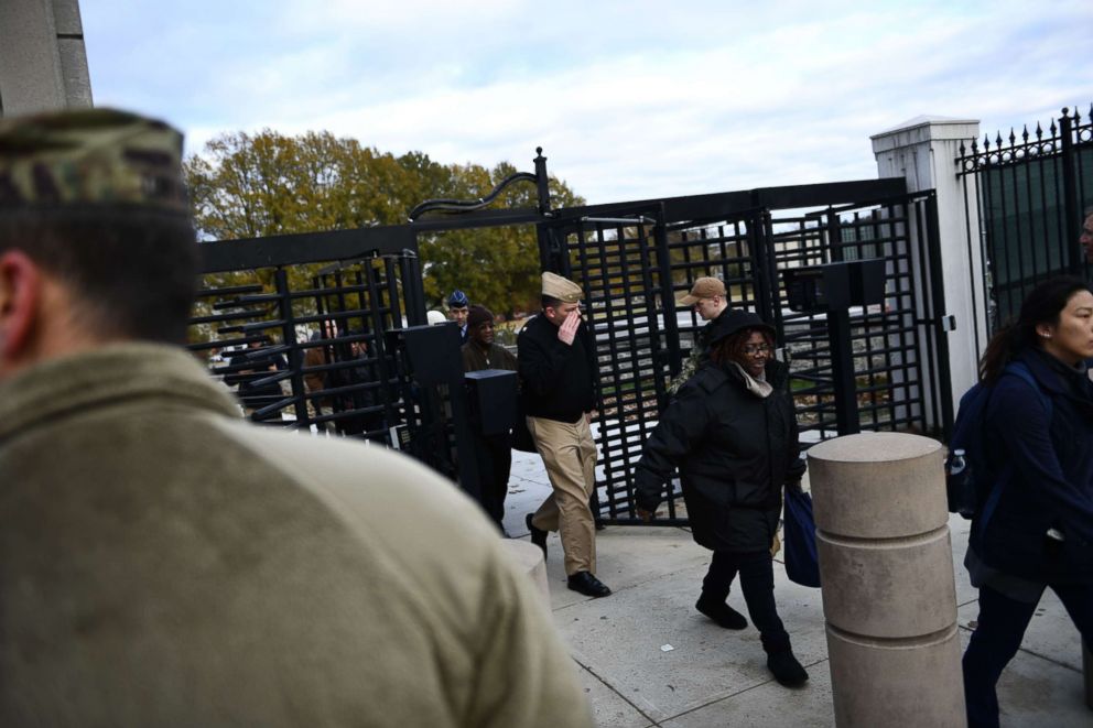 PHOTO: People leave Walter Reed National Military Medical Center in Washington, DC, during an emergency drill, Nov. 27, 2018.