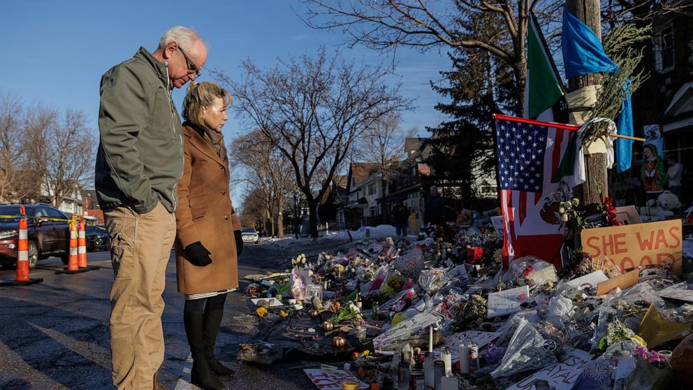 PHOTO: Minnesota Governor Tim Walz and his wife, Gwen Walz, visit a makeshift memorial for Renee Good, 37, who was shot and killed by a federal immigration agent in Minneapolis, Minnesota, January 12, 2026.