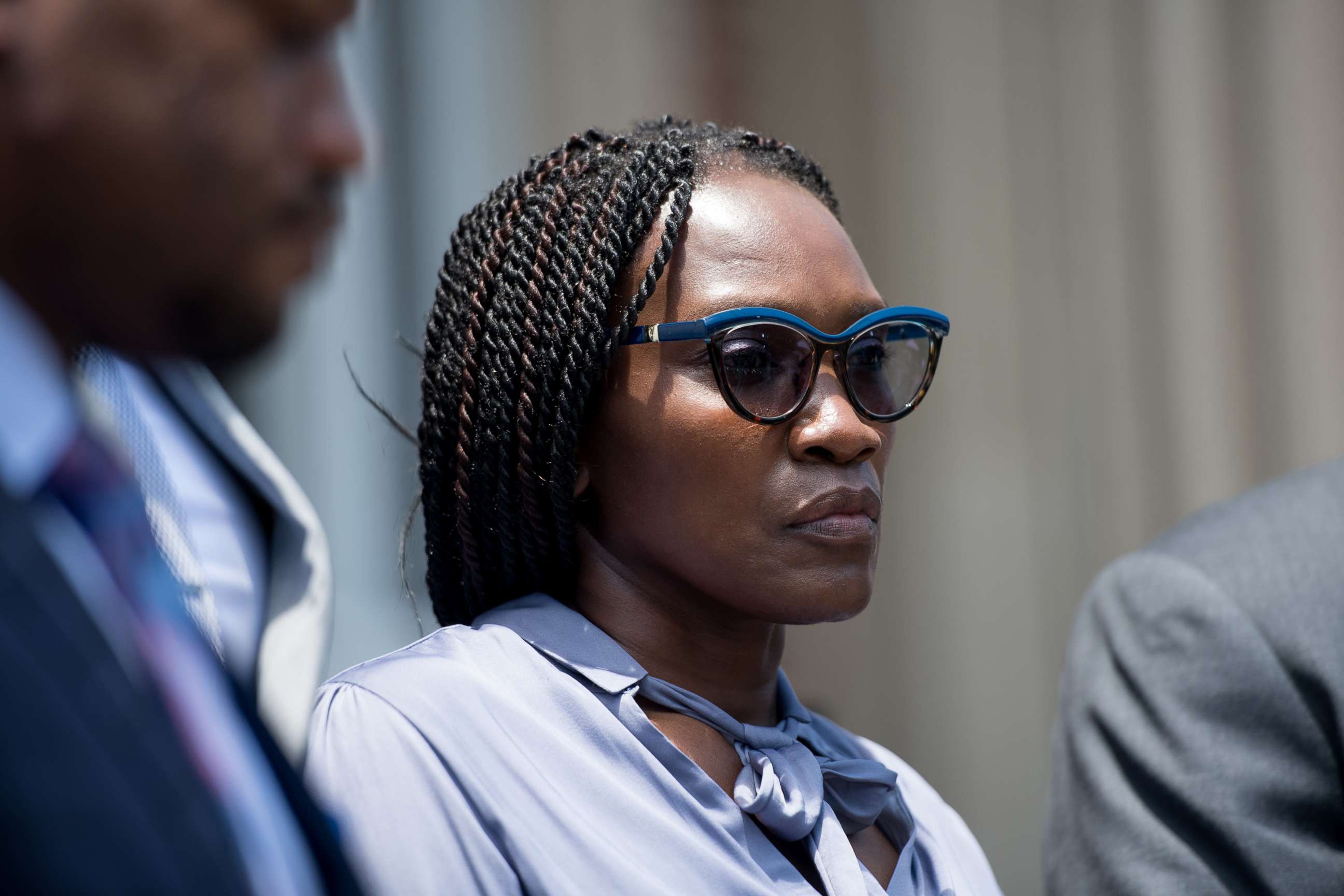 PHOTO: Wanda Cooper-Jones, mother of Ahmaud Arbery, listens as attorneys speak outside the Glynn County Courthouse on July 17, 2020 in Brunswick, Georgia.
