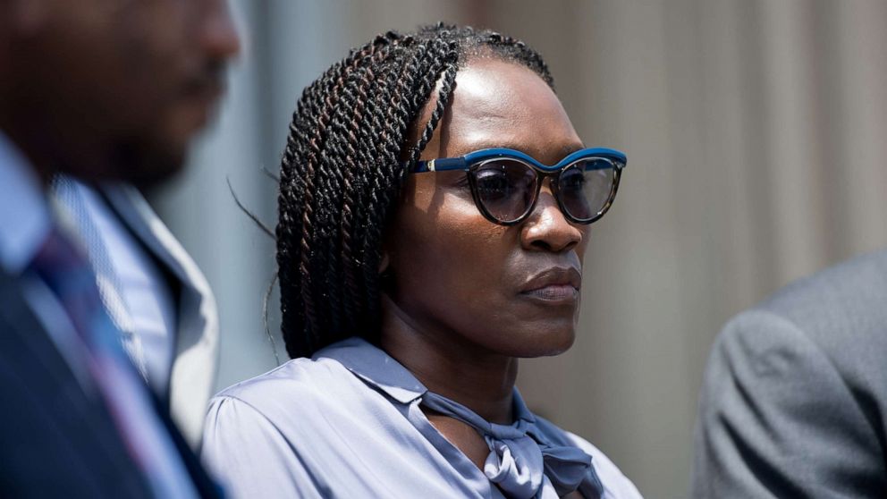 PHOTO: Wanda Cooper-Jones, mother of Ahmaud Arbery, listens as attorneys speak outside the Glynn County Courthouse on July 17, 2020 in Brunswick, Georgia.