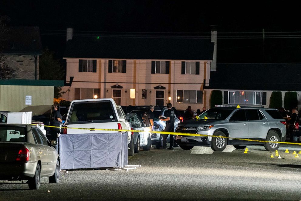 PHOTO: Investigators work near a tarp covering on Sept. 3, 2020 in Lacey, Washington.