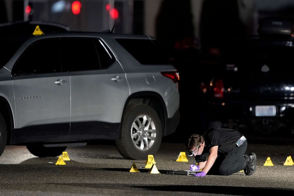 PHOTO: A Washington State Patrol Crime Lab worker looks at evidence markers, Sept. 4, 2020, in Lacey, Wash.