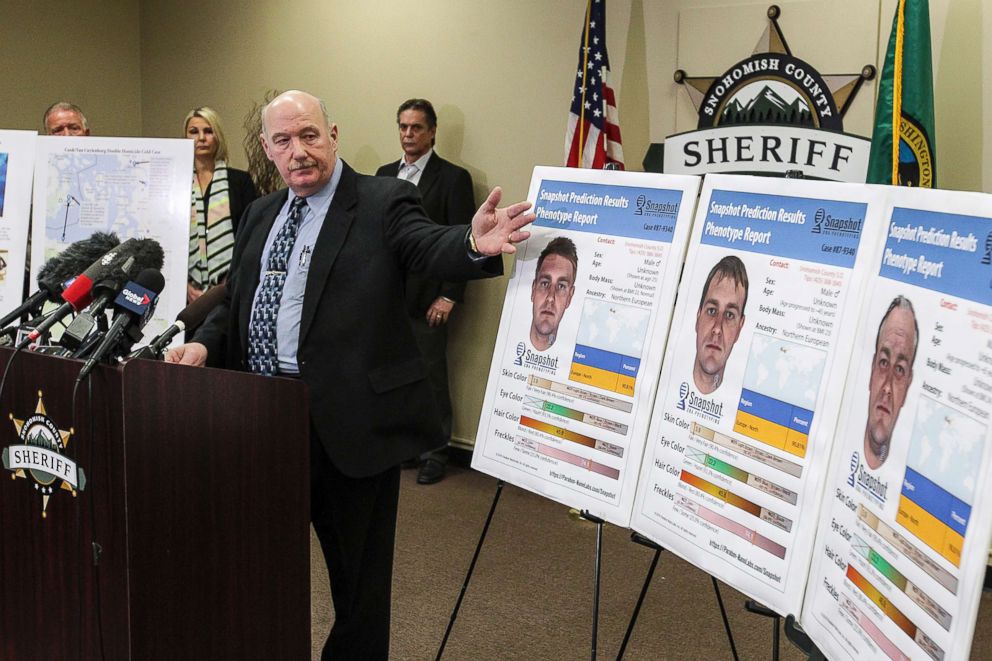 PHOTO: Detective Jim Scharf, left, presents new images rendered using phenotype technology of a potential suspect in the unsolved case of the 1987 double homicide of Jay Cook and Tanya Van Cuylenborg in Everett, Wash., on April 11, 2018.