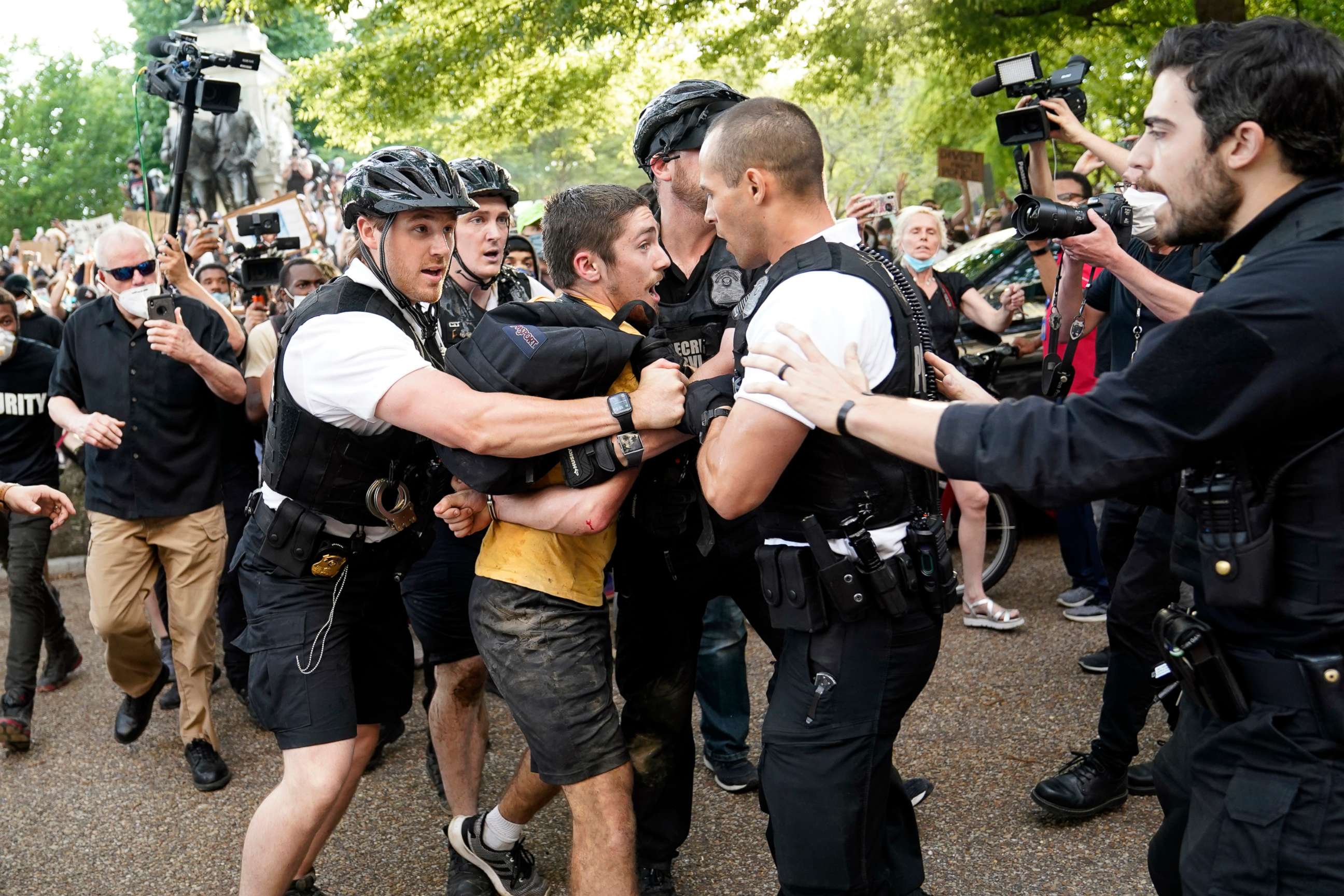 PHOTO: Uniformed U.S. Secret Service police detain a protester in Lafayette Park across from the White House as demonstrators protest the death of George Floyd, a black man who died in police custody, May 29, 2020, in Washington, D.C.