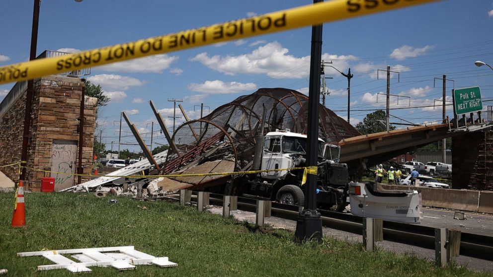 PHOTO: Debris is seen after a pedestrian bridge collapsed on June 23, 2021, in Washington, D.C.
