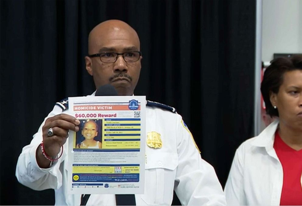 PHOTO: Police Chief Robert J. Contee III displays a reward poster seeking information about the fatal shooting of 6 year old Nyiah Courtney on Malcolm X and Martin Luther King Ave during a news conference in Washington, July 17, 2021.