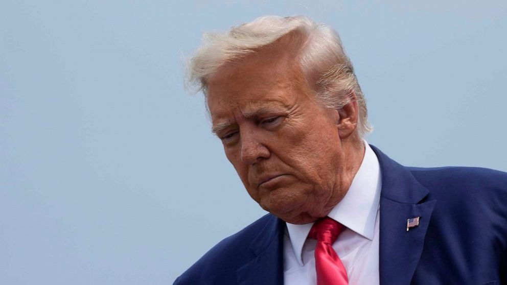 PHOTO: Former President Donald Trump arrives at Ronald Reagan Washington National Airport, Aug. 3, 2023, in Arlington, Va., as he heads to Washington to face a judge on federal conspiracy charges alleging Trump conspired to subvert the 2020 election.