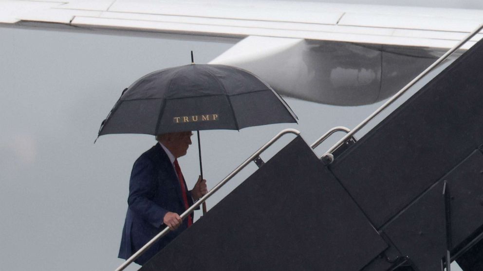 PHOTO: Former President Donald Trump boards his plane at Reagan National Airport following an arraignment in Washington, D.C. federal court, Aug. 3, 2023 in Arlington, Va.