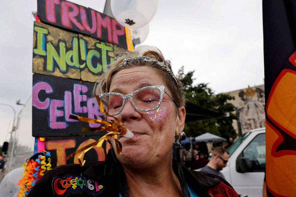 PHOTO: A demonstrator gestures on the day former U.S. President Donald Trump, who is facing federal charges related to attempts to overturn his 2020 election defeat, arrives at the U.S. District Court in Washington, Aug. 3, 2023.
