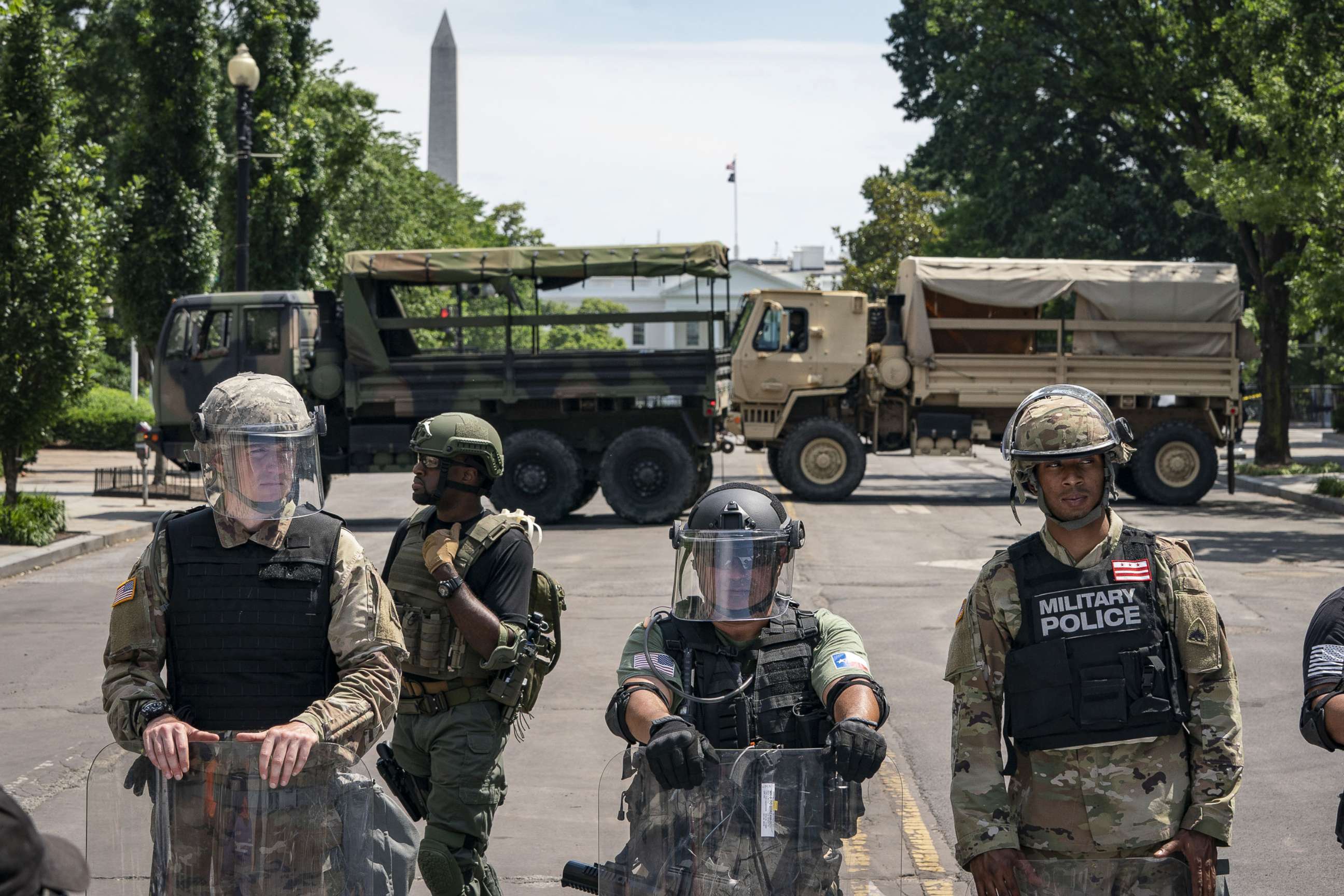 PHOTO: Police forces and National Guard vehicles are used to block 16th Street near Lafayette Park and the White House on June 3, 2020.