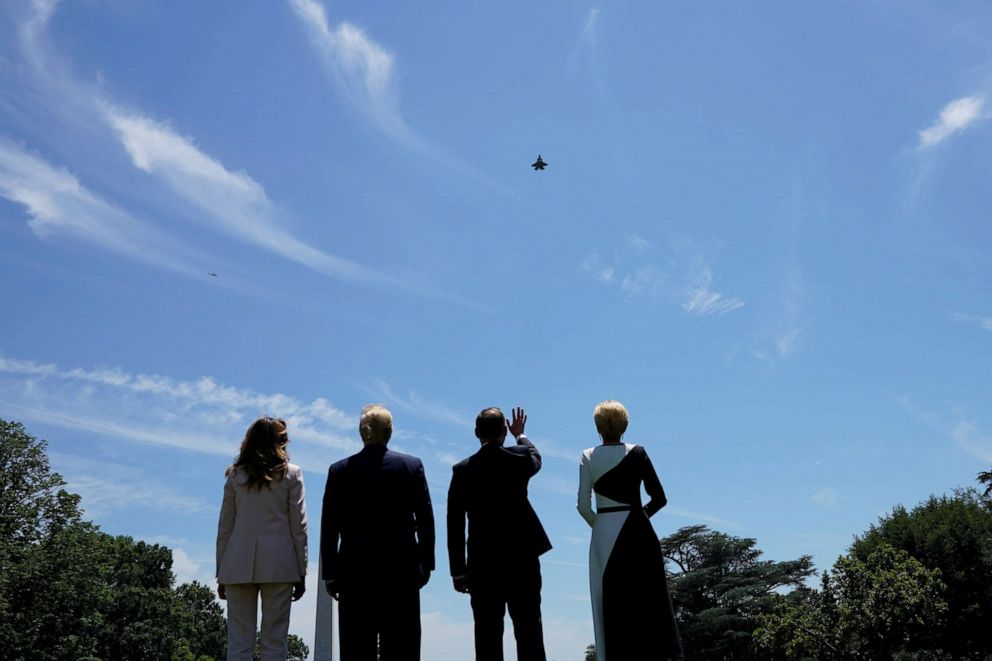 PHOTO: President Donald Trump and first lady Melania Trump stand with Poland's President Andrzej Duda and his wife, Agata Kornhauser-Duda, as they watch an F-35 flyover outside the White House in Washington, June 12, 2019.