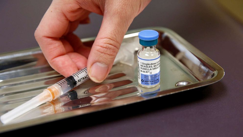 A vial of the measles, mumps, and rubella virus vaccine is pictured at the International Community Health Services clinic in Seattle, March 20, 2019.