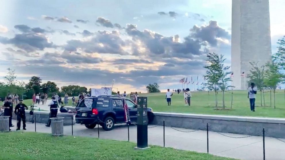 PHOTO: Park Police officers respond to the Washington Monument grounds where a vehicle had struck the security barrier located in the northeast quadrant of the Washington Monument grounds, July 3, 2021.