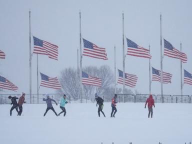 Major winter storm covers 13 states, breaking snowfall records as it moves east