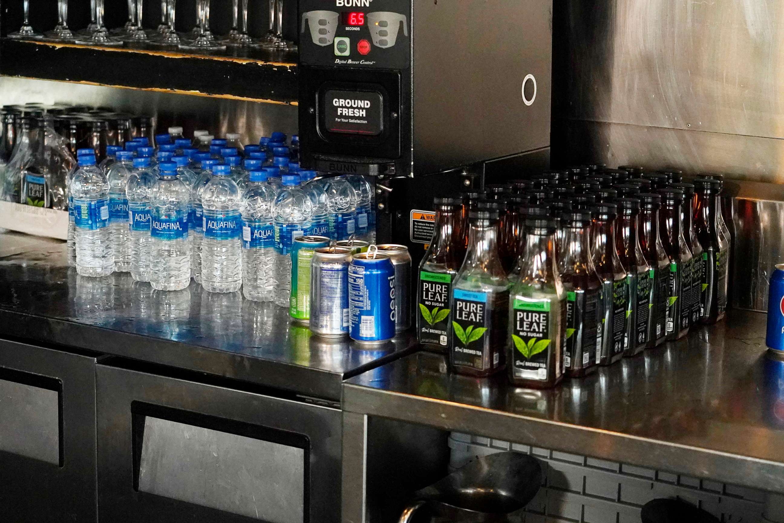 PHOTO: Walker's Drive-In, a popular mid-city eatery in Jackson, Miss., has loaded up with bottles of drinking water and pre-made tea, during the latest challenges due to longstanding water system problems in Jackson, Miss., Aug. 30, 2022.