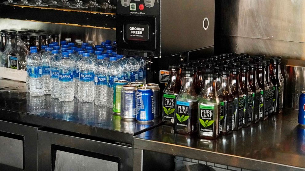PHOTO: Walker's Drive-In, a popular mid-city eatery in Jackson, Miss., has loaded up with bottles of drinking water and pre-made tea, during the latest challenges due to longstanding water system problems in Jackson, Miss., Aug. 30, 2022.