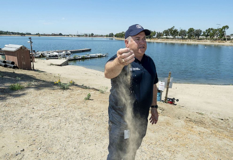 PHOTO: In this August 26, 2019, file photo, Yorba Linda Water District General Manager Marc Marcantonio talks about the sandy nature around the district basins that capture water from the Santa Ana River at the Santa Ana River Lakes in Anaheim, CA.