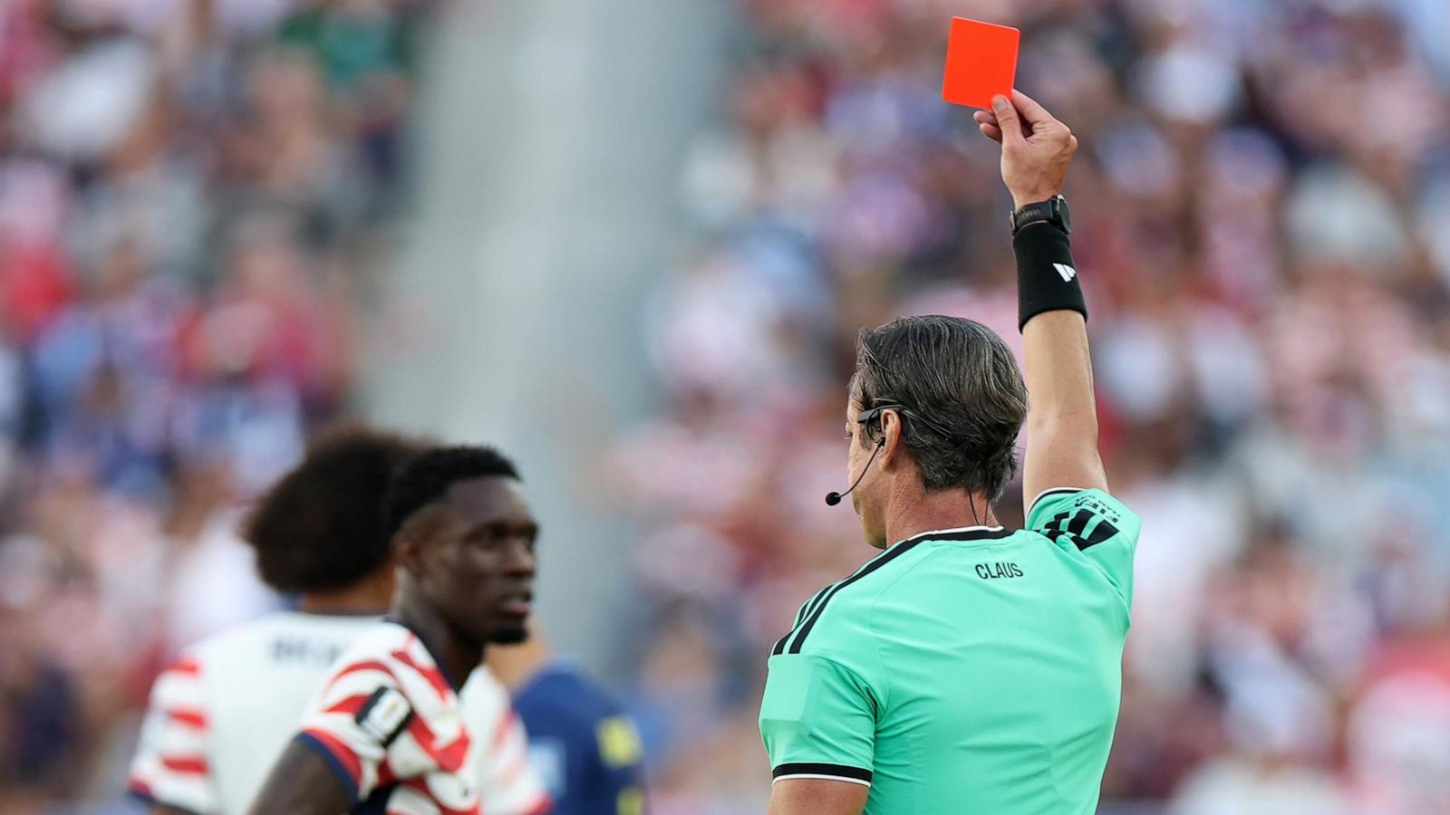 PHOTO: Referee Raphael Claus shows Folarin Balogun of the United States a red card for a foul on Tarik Muharemovic of Bosnia and Herzegovina during their FIFA World Cup 2026 Round of 32 match, July 01, 2026 in Santa Clara, Calif.