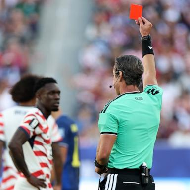 PHOTO: Referee Raphael Claus shows Folarin Balogun of the United States a red card for a foul on Tarik Muharemovic of Bosnia and Herzegovina during their FIFA World Cup 2026 Round of 32 match, July 01, 2026 in Santa Clara, Calif.