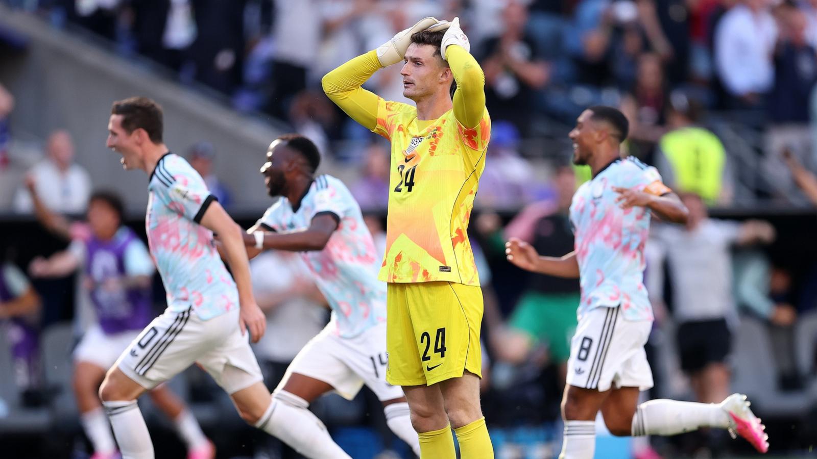PHOTO: Goalkeeper Matt Freese of the United States reacts after Belgium's Hans Vanaken (L) celebrates scoring his team's third goal during their FIFA World Cup 2026 Round of 16 match, July 6, 2026 in Seattle.