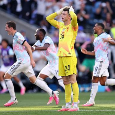 PHOTO: Goalkeeper Matt Freese of the United States reacts after Belgium's Hans Vanaken (L) celebrates scoring his team's third goal during their FIFA World Cup 2026 Round of 16 match, July 6, 2026 in Seattle.