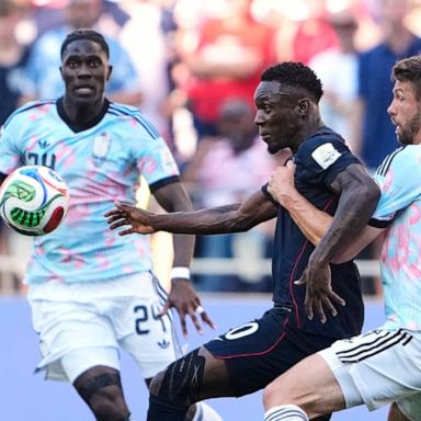 PHOTO: United States' Folarin Balogun battles for the ball with Belgium's Brandon Mechele during their World Cup round of 16 soccer match in Seattle, July 6, 2026. 