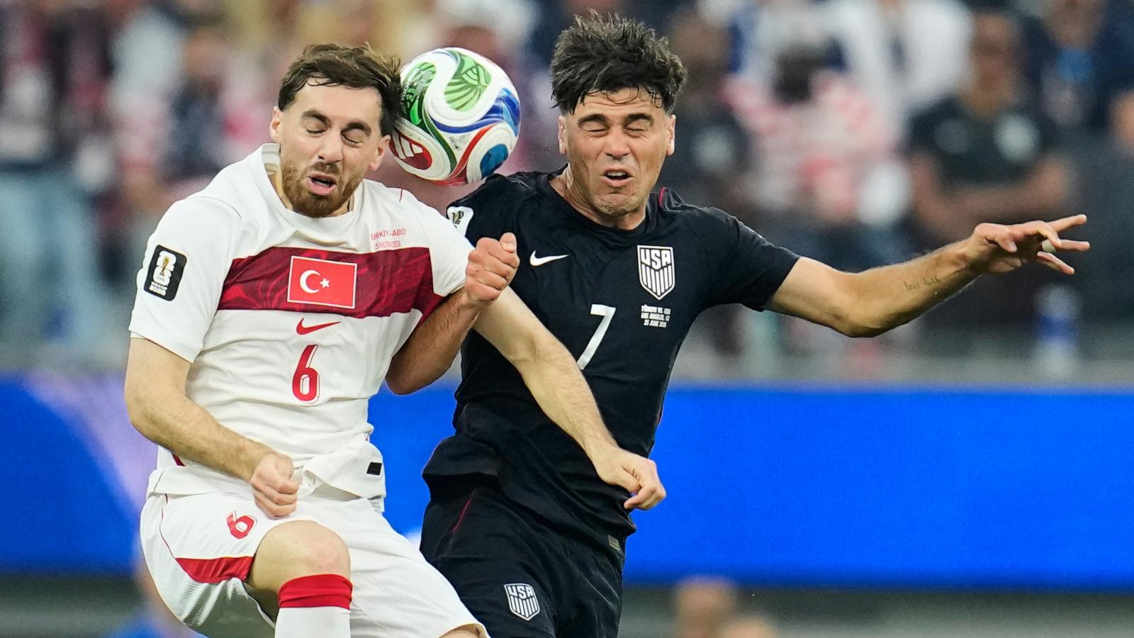 PHOTO: United States' Giovanni Reyna and Turkey's Orkun Kokcu battle for the ball during their FIFA World Cup 2026 Group D soccer match in Los Angeles, June 25, 2026.