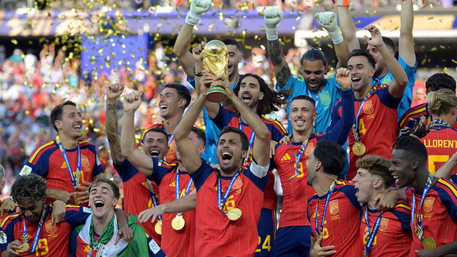 PHOTO: Spain's midfielder Rodri lifts the trophy with his teammates after defeating Argentina to win the FIFA World Cup 2026 football tournament in East Rutherford, July 19, 2026.