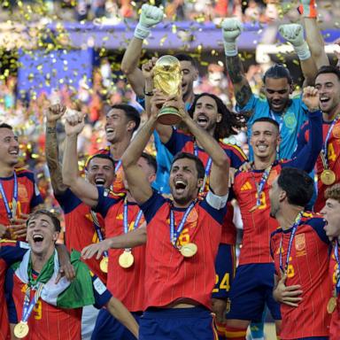 PHOTO: Spain's midfielder Rodri lifts the trophy with his teammates after defeating Argentina to win the FIFA World Cup 2026 football tournament in East Rutherford, July 19, 2026. 