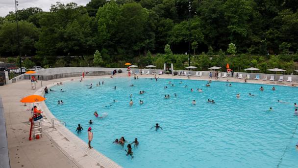 People swim in the newly opened Gottesman Pool at the Davis Center in Harlem Meer on the first day of the summer pool season in New York, June 27, 2025 in New York City.